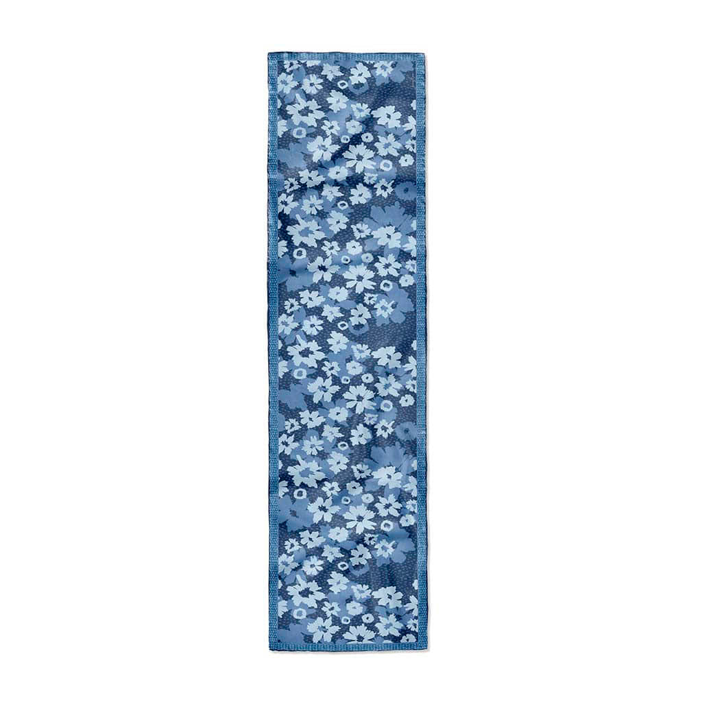 Image of a 16x72&quot; silk habotai scarf with abstract blooms in shades of blue. Border is a hand designed dot pattern. 