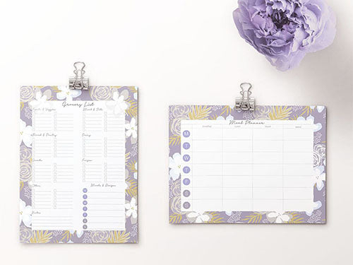 image of two planning pages with floral designs in purple, yellow, and cream around the outside edges. Shown are the grocery list and weekly planner
