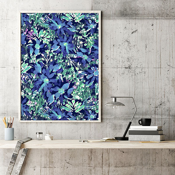 Floral Art Print in a frame above an industrial looking desk