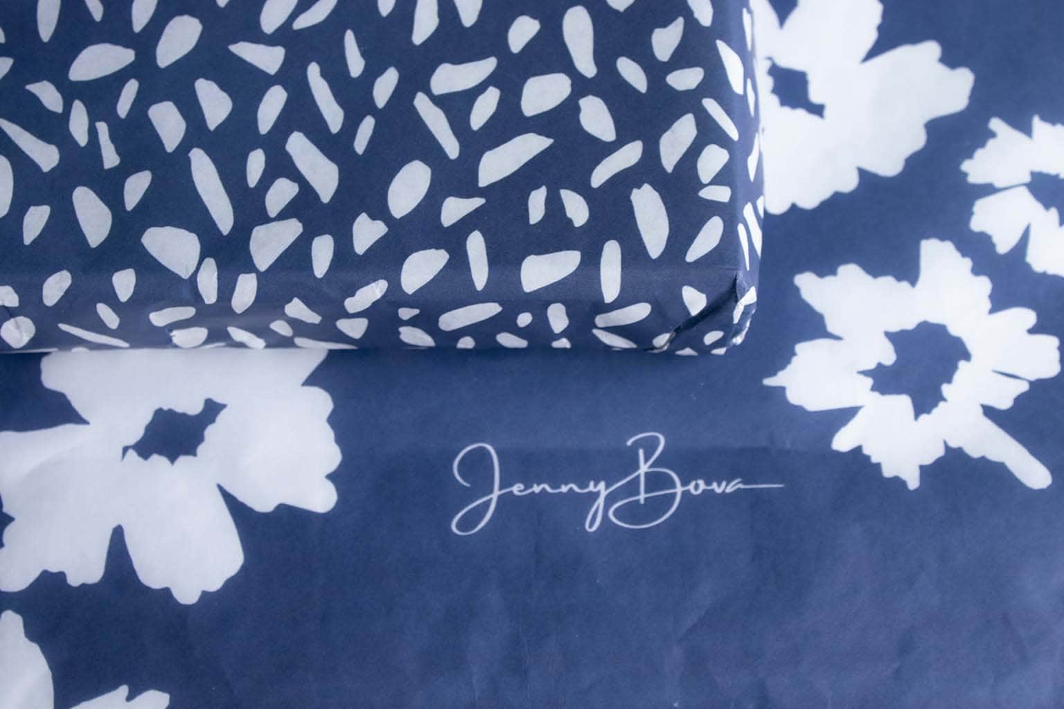 blue and white tissue paper with jenny bova logo
