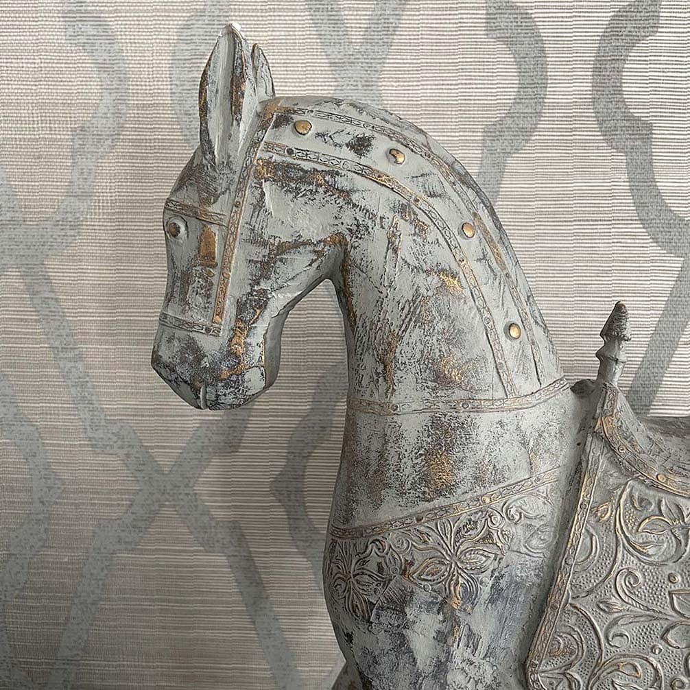 distressed horse head decor and geometric grasscloth wallpaer