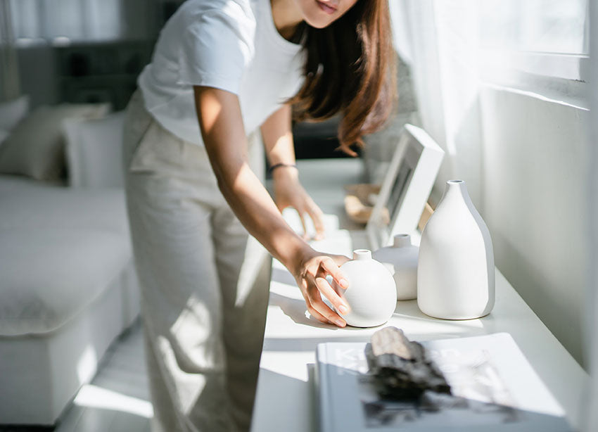 interior designer styling a living room