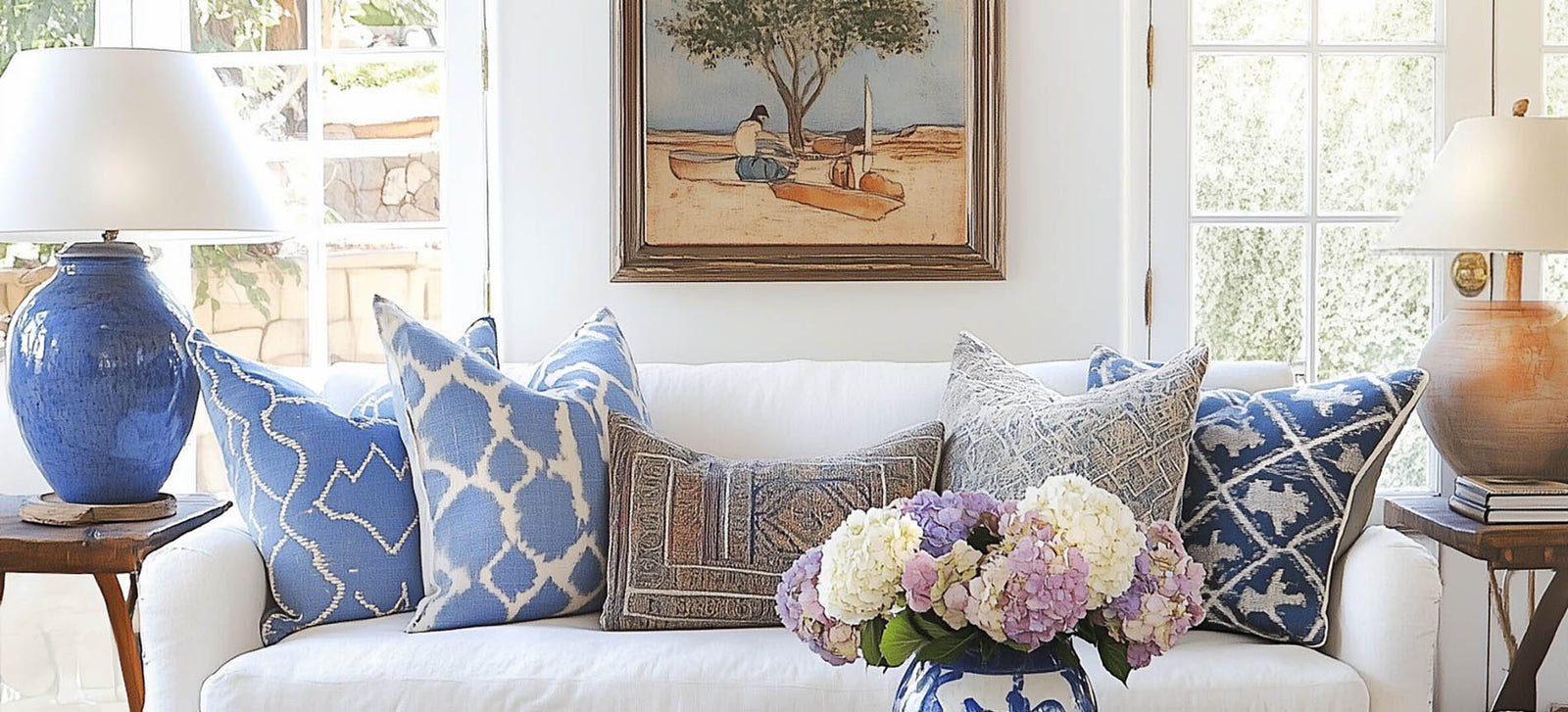 casual creative living room with artwork and colorful pillows