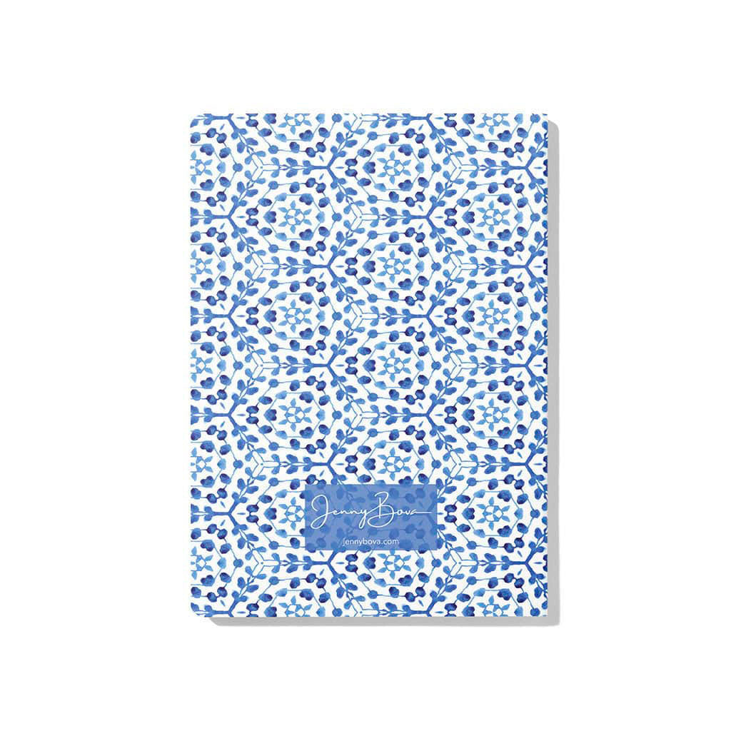 Back cover of Jenny Bova&#39;s Watercolor Vines notebook, which features blue watercolor leafy vines on a white background. Close to the bottom is a blue rectangle with the Jenny Bova logo on it in white.