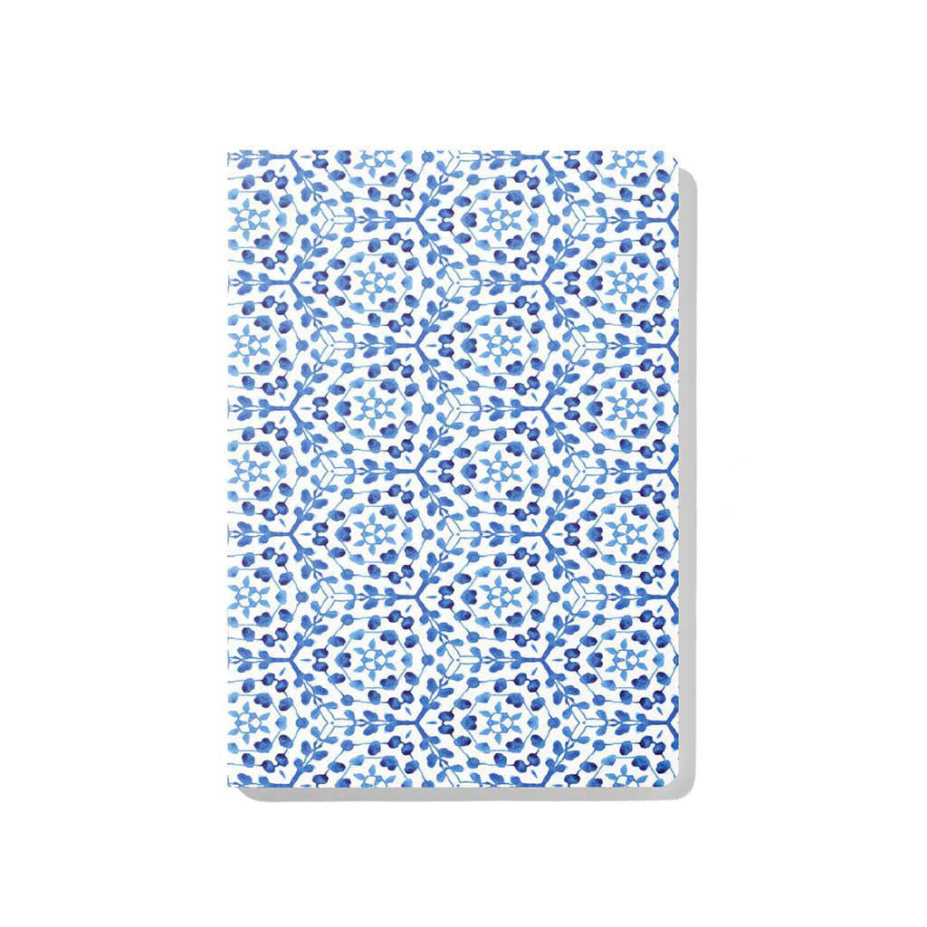 Front cover of Jenny Bova&#39;s Watercolor Vines notebook, which features blue watercolor leafy vines on a white background. 